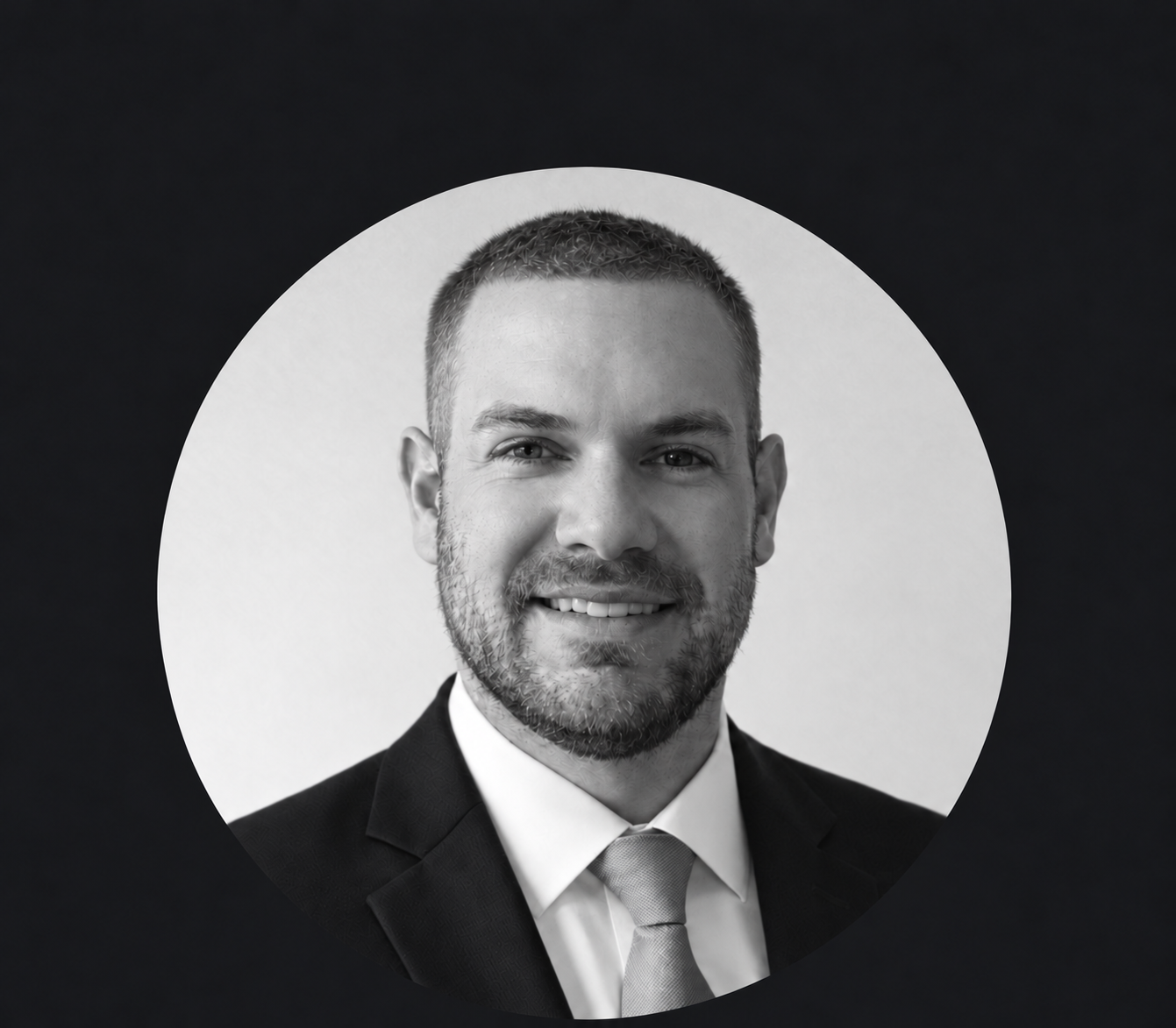 Josh Walker, founder of Walker Web Design, in a suit and tie